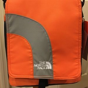 Orange North Face bag
